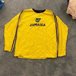 Yellow, long sleeve Jamaica shirt.